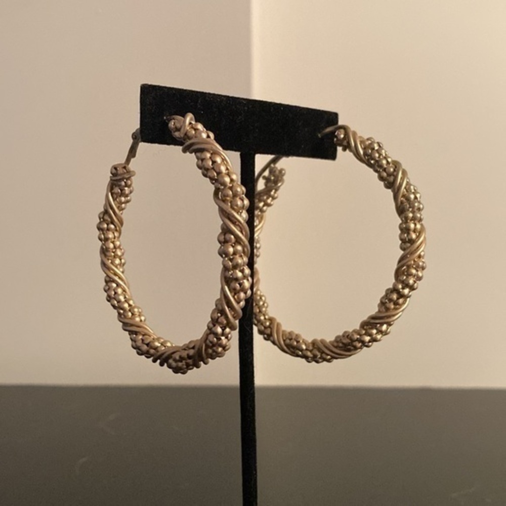 MIA large golden hoops.